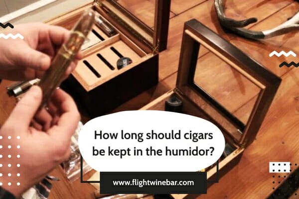 How long should cigars be kept in the humidor